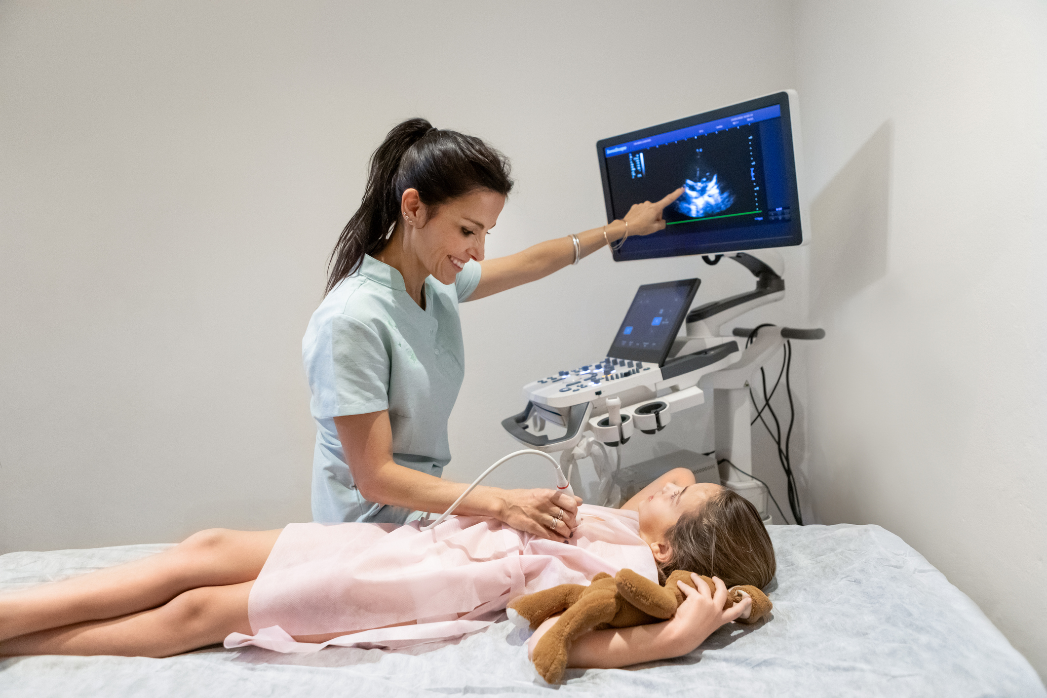Cardiologist performing an echocardiogram on a girl patient - Buenos Aires - Argentina
